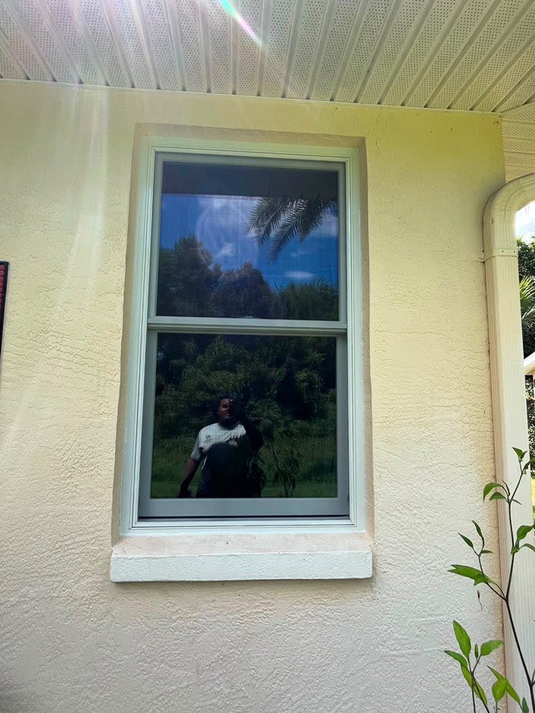 Window replacement under a covered porch in Jacksonville, FL — Sunrise Exteriors